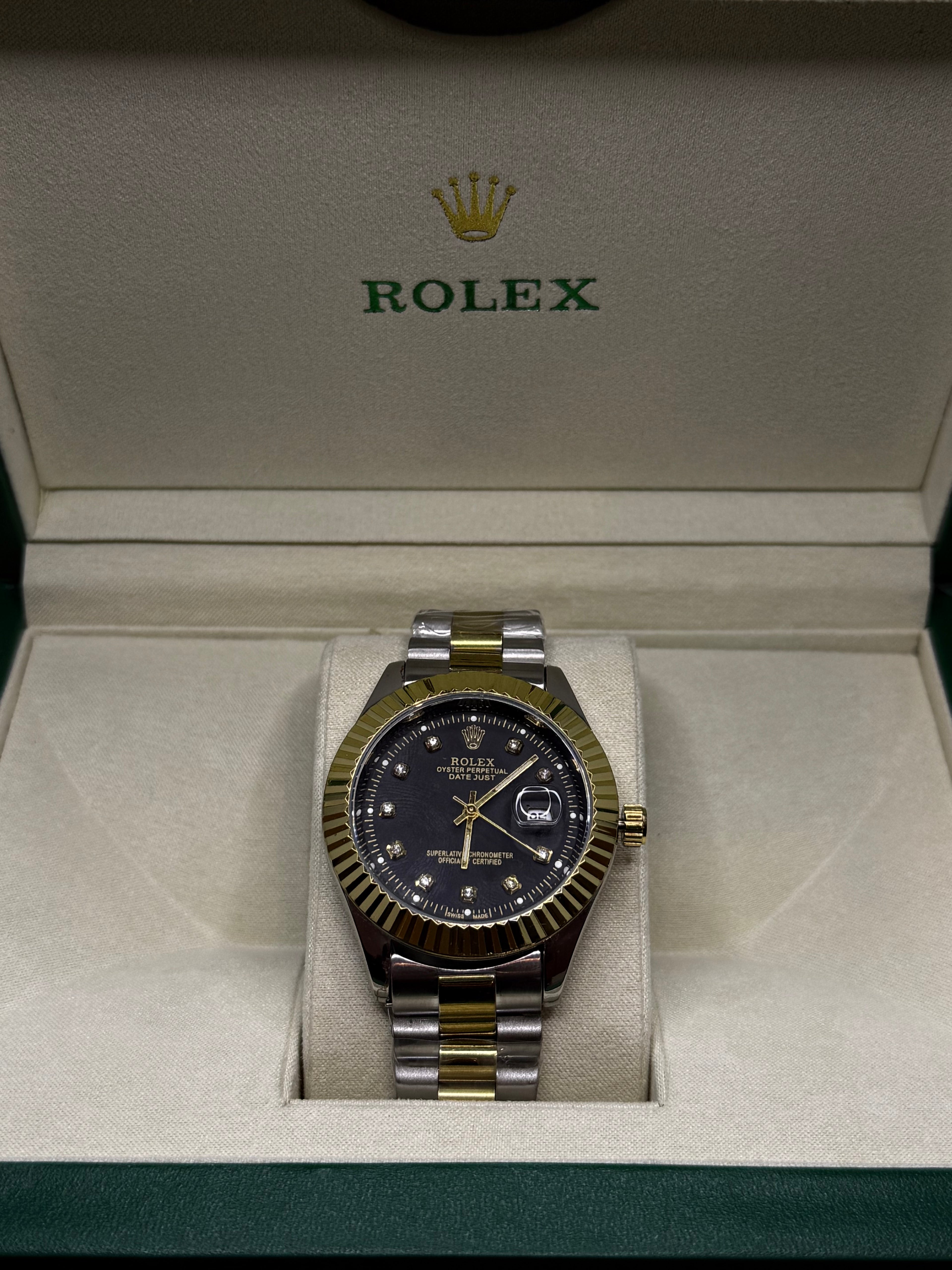 Rolex silver gold dual tone watch black dial luxury timepiece Pakistan