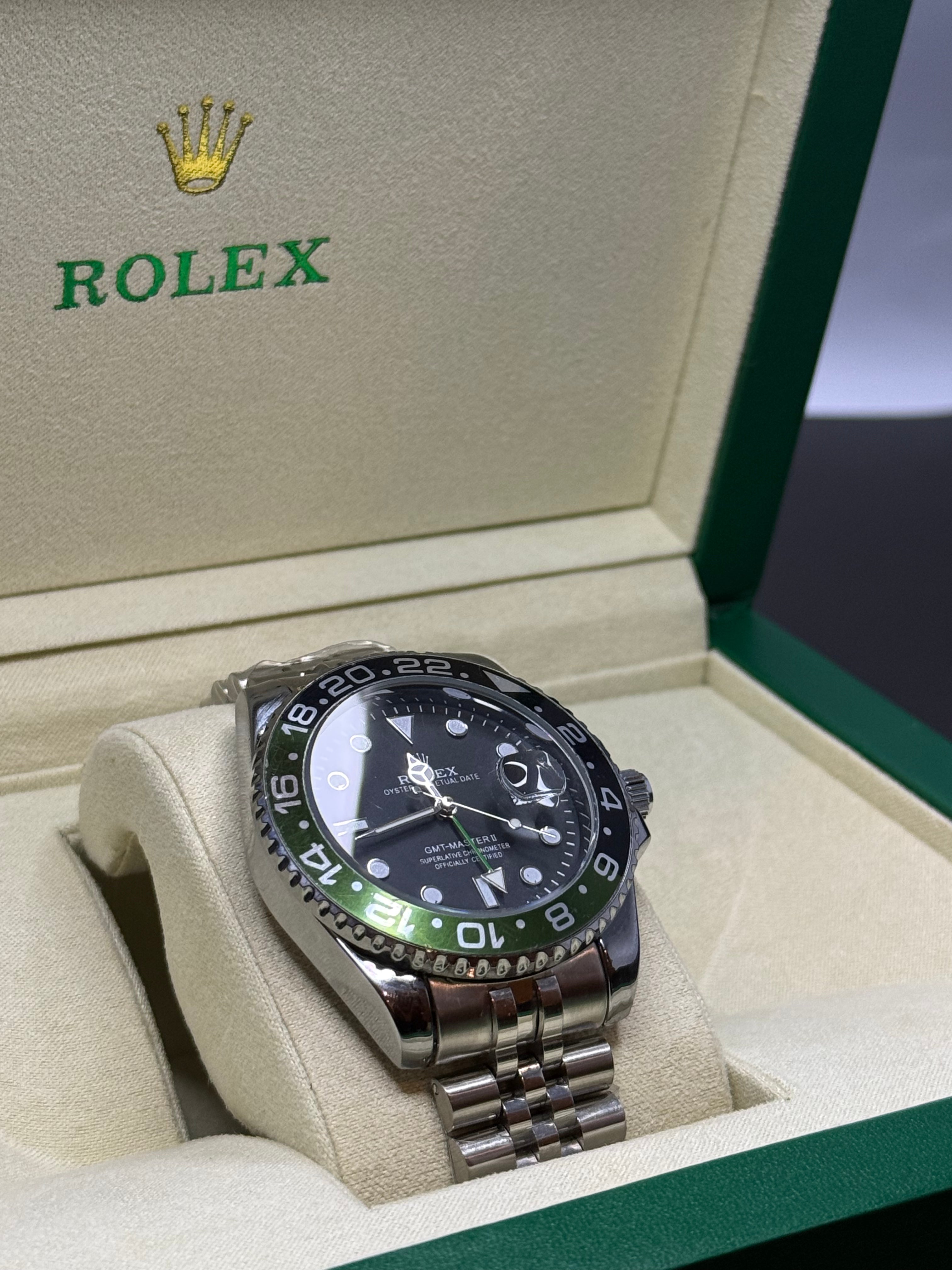 Rolex Silver Case Watch – Black Dial with Green Accents - SheikhStore