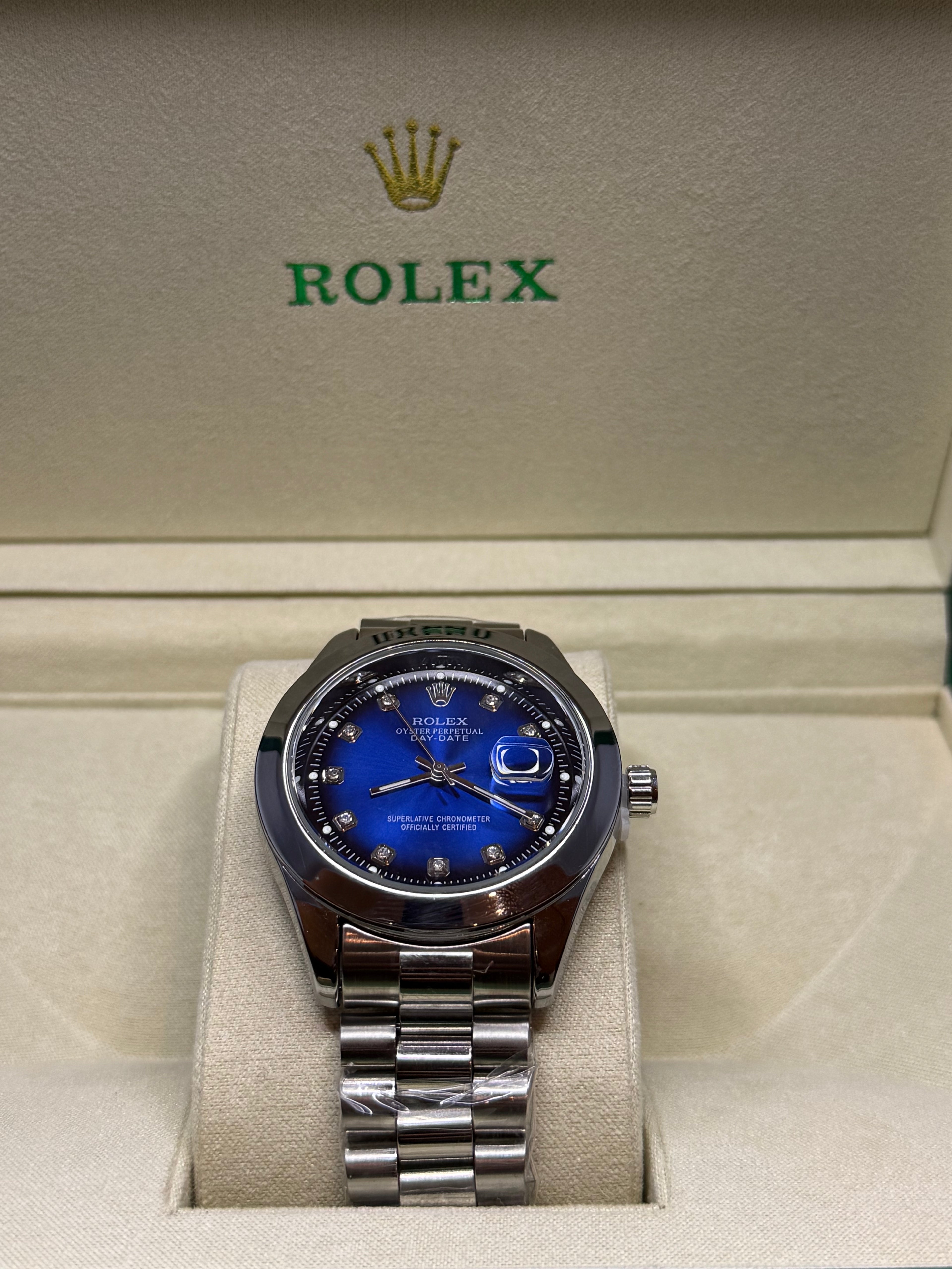 Rolex silver steel day date watch blue dial luxury timepiece Pakistan
